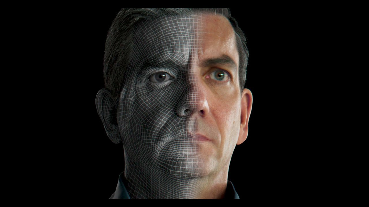 Half of a man's face with a digital wireframe mesh overlay, illustrating the concept of a digital human or avatar creation